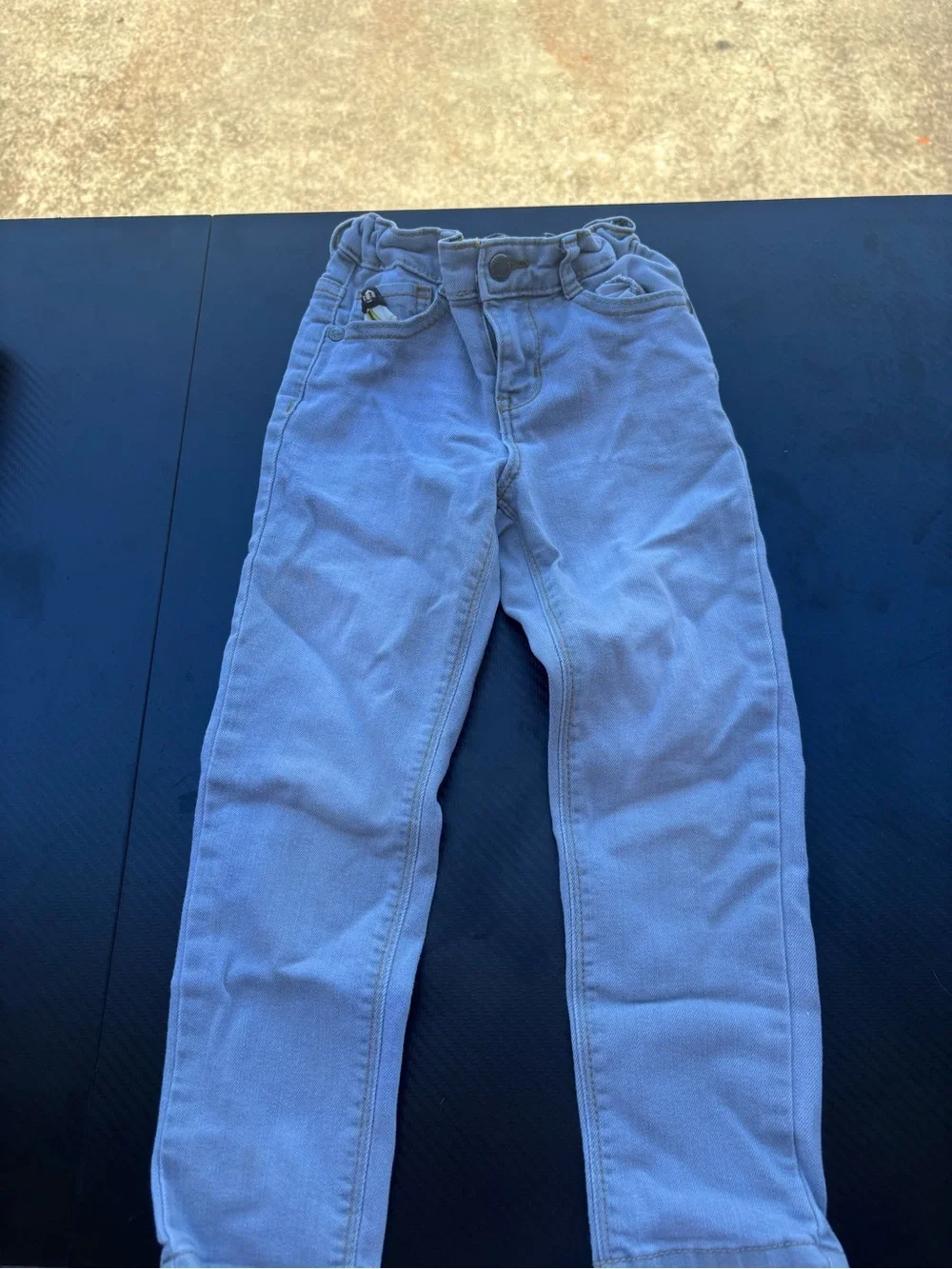 Assorted lot of five pairs of jeans, all size 4